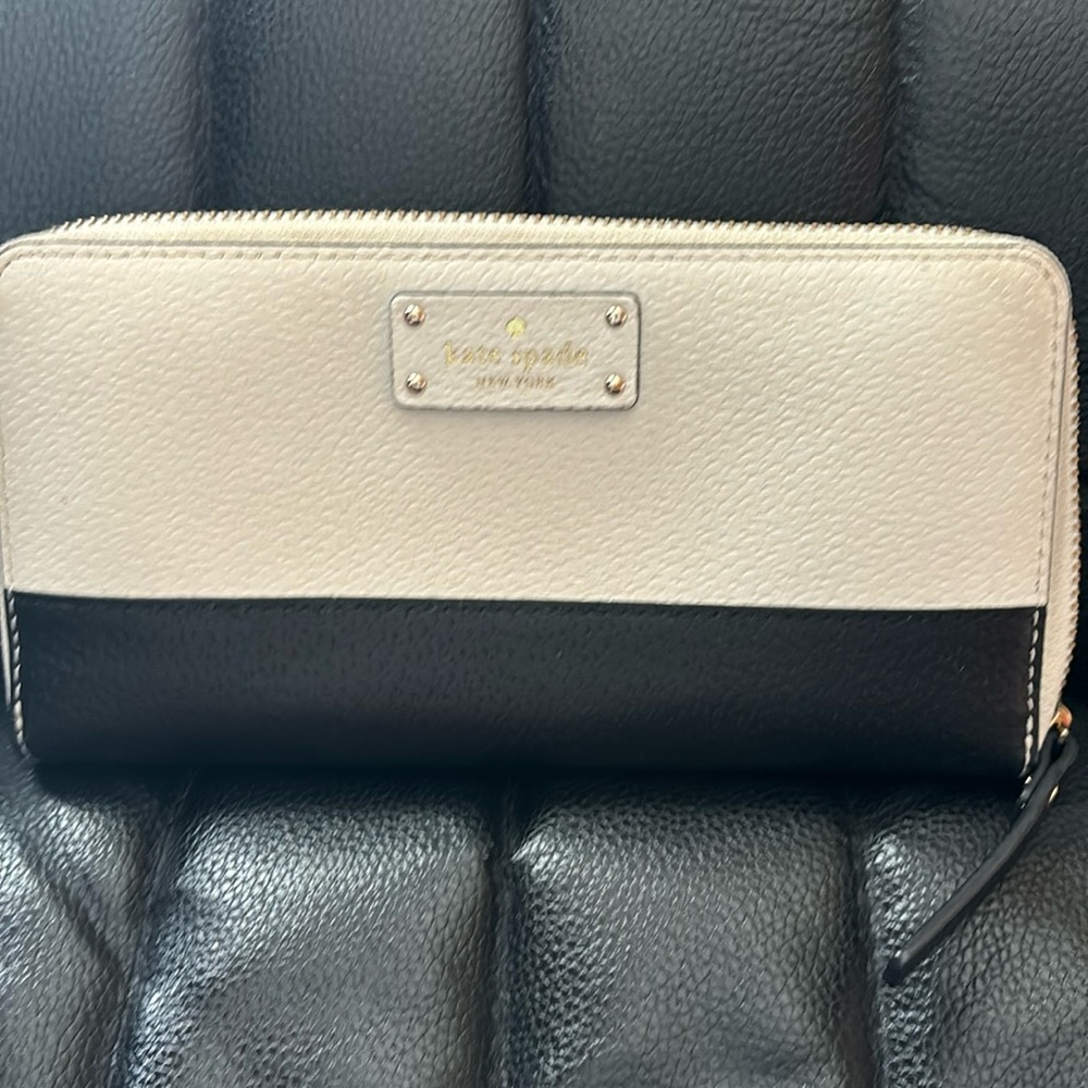 Kate Spade cream and black wallet.